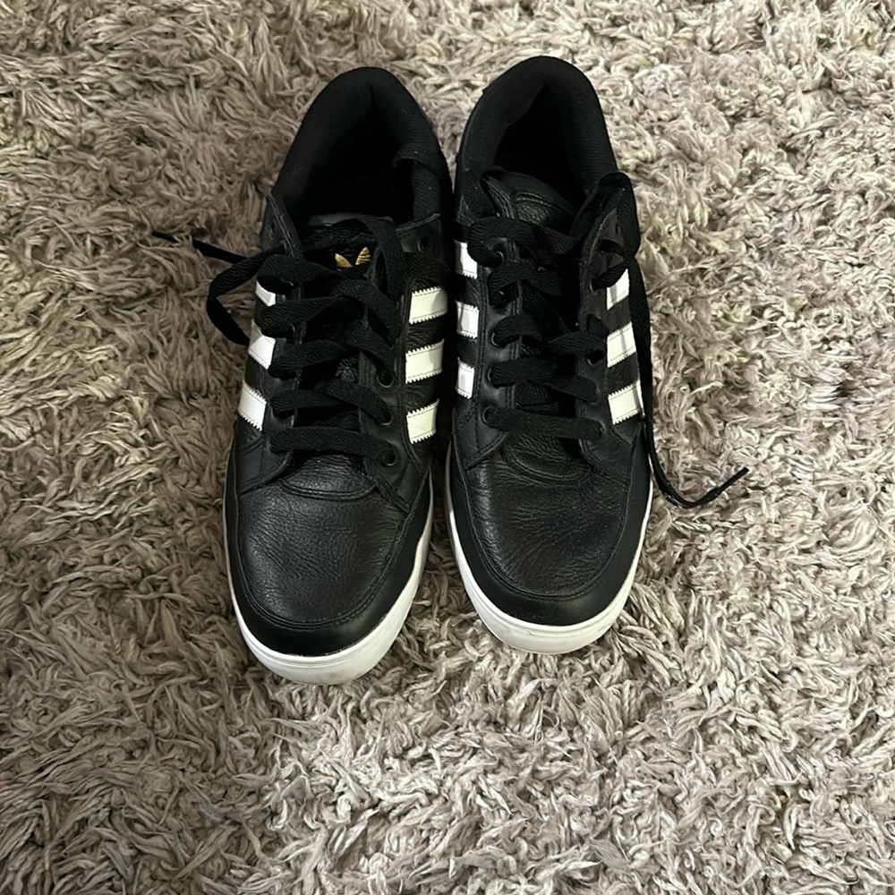 Neatly used Adidas sneakers